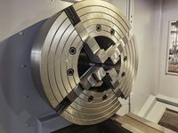 Передний четырёхкулачковый патрон трубонарезного станка SMTCL с большим проходным отверстием шпинделя