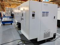 Токарный станок SMTCL T5-1000Q сзади: длинный кожух станины, электрошкаф с кондиционером и вентилируемый короб
